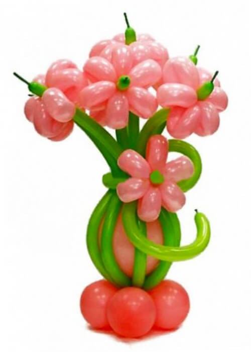 Букет из 9 цветов из воздушных шаров с бантом на подставке. Высота: 1,2м. Возможно любое количество цветов в букете. Цветовую гамму уточняйте при заказе